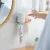 Import Hanging Gargle Bathroom Storage Rack Simple Free Punch Wall Hanging Double Card Toothbrush Holder With Toothpaste from China