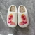 Import Home winter warm Plush anti slip smiling face boots printed cotton embroidery slide slippers from China