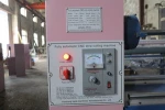 Nonwoven textile fabric slitting machine
