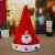 Import red Christmas Top Grade Short Plush Christmas Hat for kids adults with LED lights from China