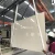 Import Royal Cream Artificial stone polished slab Carrara artificial marble products stone panels supplier from China