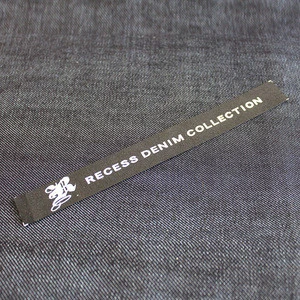 The woven label of custom clothing is a trademark of clothing manufacture