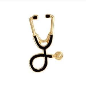 Wholesale cute stethoscope shape alloy brooch for clothes