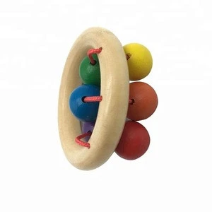 Wholesale safety high quality hand bell best wood baby toy rattle early educational toy