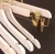 Import wholesale wooden hanger stand for clothes kid hanger in gold hook cloth hanger rack standing from China