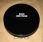 Shoe polish box and wax