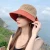 Import 2021 new summer sun hat mesh breathable fisherman hat hollow beach woven straw hat from China