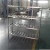 Import Custom Sizes Floor Stand Heavy Duty Stainless Steel Commercial Kitchen Rack Storage Shelf 4 Layers from China