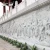 Import High quality modern outside durable cast stone carved wall relief sculpture from China
