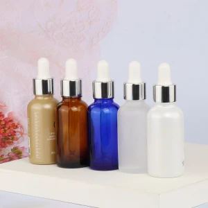 In stock wholesale pastel color 30ml 1oz pink yellow white green glass bottle with dropper serum lotion essential oil packaging