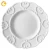 Import JINTCH Wholesale white ceramic engraving flat starter plate dishes embossed porcelain plates for wedding from Pakistan
