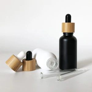 LANJING Hot 5ml 10ml 15ml 20ml 30ml 50ml 100ml bamboo cap essential oil bottle matte black white frosted glass dropper bottle