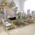 Import Luxury home dining room furniture golden stainless steel dining table set from China
