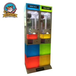 Mini coin operated vending games 2 players toy crane claw machine