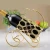 Import novelty home decoration accessories black resin animal crafts wine bottle holder from China