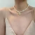 Import Single Strand Imitation Pearl Love Pendant Metal Necklace Baroque Palace Style Heart Open Exquisite Choker Clavicle Necklace from China