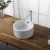 Import White Porcelain Bathroom Sink Sanitary Wares Ceramic Table Top Wash Basin from China