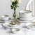 Import WKTDS04  chaozhou luxury wedding gold rimmed line plated ceramic dinnerware dinning plate and bowl marble dinner set porcelain from China