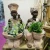 Import African woman man sitting plants holder vase resin crafts supplies for front door decoration from China