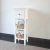 Import cheap price small portable ready made bathroom storage cabinet with bamboo baskets decoration from China
