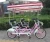 Import fashion family pedal with four seater four wheel surrey bike/ 4 person tandem surrey bicycle/quadricycle bike from China