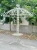 Import garden decoration metal Arch Arbor With Planters from China