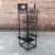 Import Heavy duty movable umbrella stand with wheels for store umbrella display rack from China