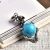 Import Hot Selling Natural Crystal Pendant Turquoise Stone Bone Pendant Round Bead Necklace Couple Decoration Halloween Gift from China