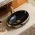 Import Luxury modern vessel lavabo oval art basin ceramic gold black bathroom sink counter top hand wash basin from China