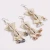 Import Original conch shell earrings hand-woven cane beaded pearl earrings latest design of pearl earrings from China