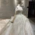Import polyester lace fabric floor length chapel train white net v-neck sleeveless off-shoulder champagne bridal wedding dress from China