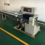 Shanghai automatic fudge sugar candy/sandwiches/egg cakes/mooncake/butter/scones/sponges sugar pillow flow packing machine