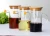 Import Wholesale 400ml Oil Vinegar Glass Bottles Cylinder Shape Glass Jars for Seasoning Oil with Spout and lid from China