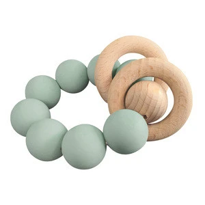 Wholesale wooden teething toys silicone baby teether with 2 wooden bracelet silicone teether beads