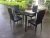 Import zhangzhou factory modern glass top dining table sets from China