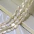 Import 10-11mm AAA grade irregular keshi real cultured fresh water freshwater pearl beads pearl strand natural pearls wholesale from China