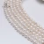 Import 9-10mm White Color Oval Potato Shaped Fresh Water Pearl Strand from China