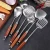 Import Amazon Stainless steel 304 kitchenware Rosewood Wooden Handle  kitchen utensils from China