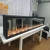 Import customized size cobbestonesfour screen video flame artificial electric fireplace with video crackling burning sound and logs from China