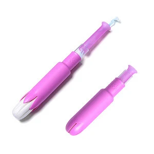 Disposable organic cotton tampons with plastic applicator