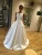 Import Floor Length Bow V Back Sleeve Satin Simple Elegant Modern Wedding Dress With Pocket from China