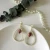 Import Gold Plated Flower Dry Flower Earrings Rose Earrings Handmade jewelry Pearl Drop Rose Earrings for women from China