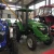 Import green hood and white hub 4x4 driving model 55hp diesel engine agricultural tractors with hydraulic steering from China