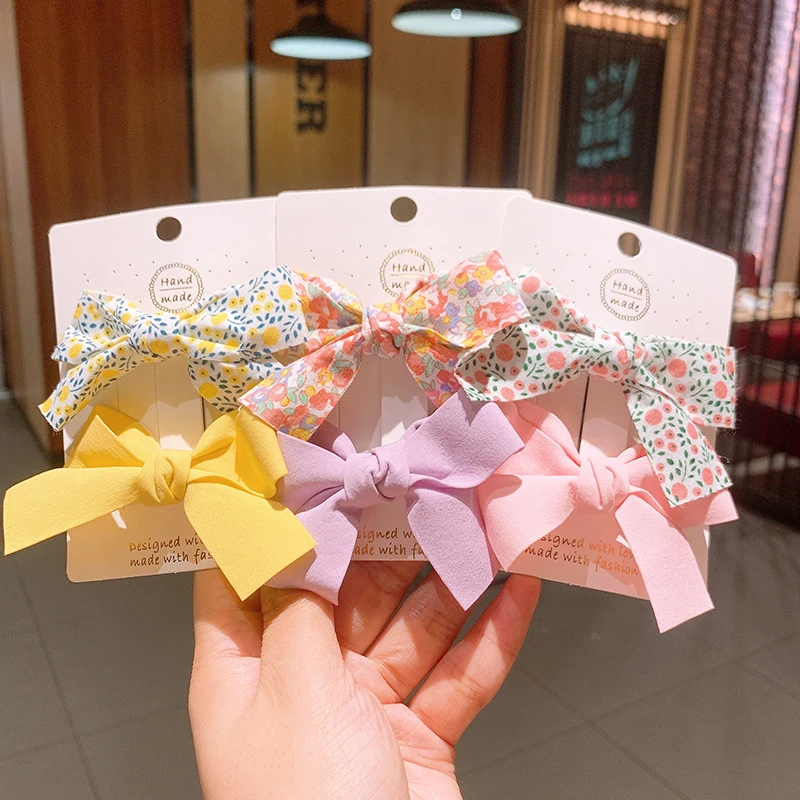 Lovely cute little girls hair accessories flower print and solid color plain fabric bow alligator hair clips for kids gift