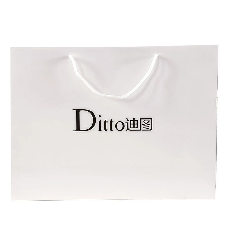 Wholesale and retail square luxury personalized paper bags with customized logo with a handle, Kraft paper bags for gift