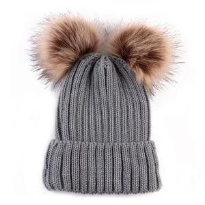 Wholesale warm winter women knitted hat beanie with double pom pom