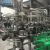 Import 4 in 1 Automatic Juice Production Line Glass Bottle Juice Filling Machine from China