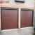Import Automatic wooden look skin sectional steel garage door from China
