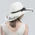 Import Custom Made Women Summer Beach White Folding Paper Straw Hat White With Bow Ribbon from China