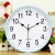 Import Factory directly wholesale cheap corporation promotion gift plastic wall clock round home decoration wall watch custom logo hour from China